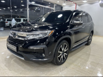 Honda  Pilot  2022  Automatic  80,000 Km  4 Cylinder  Front Wheel Drive (FWD)  SUV  Black  With Warranty