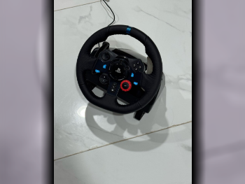 ملحقات اجهزة العاب الفيديو عجلة القيادة مع مغير السرع  - لوجيتك  - جي 29  - أسود