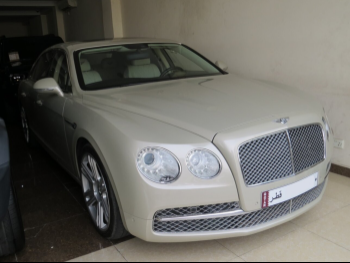 Bentley  GT  2014  Automatic  85,000 Km  12 Cylinder  All Wheel Drive (AWD)  Sedan  Beige