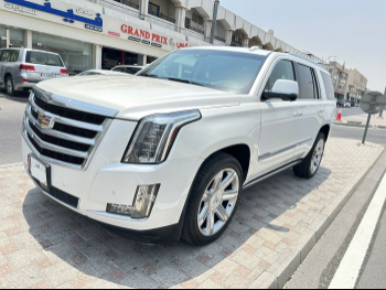 Cadillac  Escalade  2016  Automatic  217,000 Km  8 Cylinder  Four Wheel Drive (4WD)  SUV  White