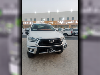 Toyota  Hilux  SR5  2021  Automatic  140,000 Km  4 Cylinder  Four Wheel Drive (4WD)  Pick Up  White