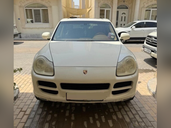 بورش  كيان  اس  2006  اوتوماتيك  230,000 كم  8 سلندر  دفع رباعي  اس يو في  أبيض