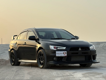 Mitsubishi  Lancer  Evolution MR  2011  Manual  91,000 Km  4 Cylinder  All Wheel Drive (AWD)  Sedan  Black