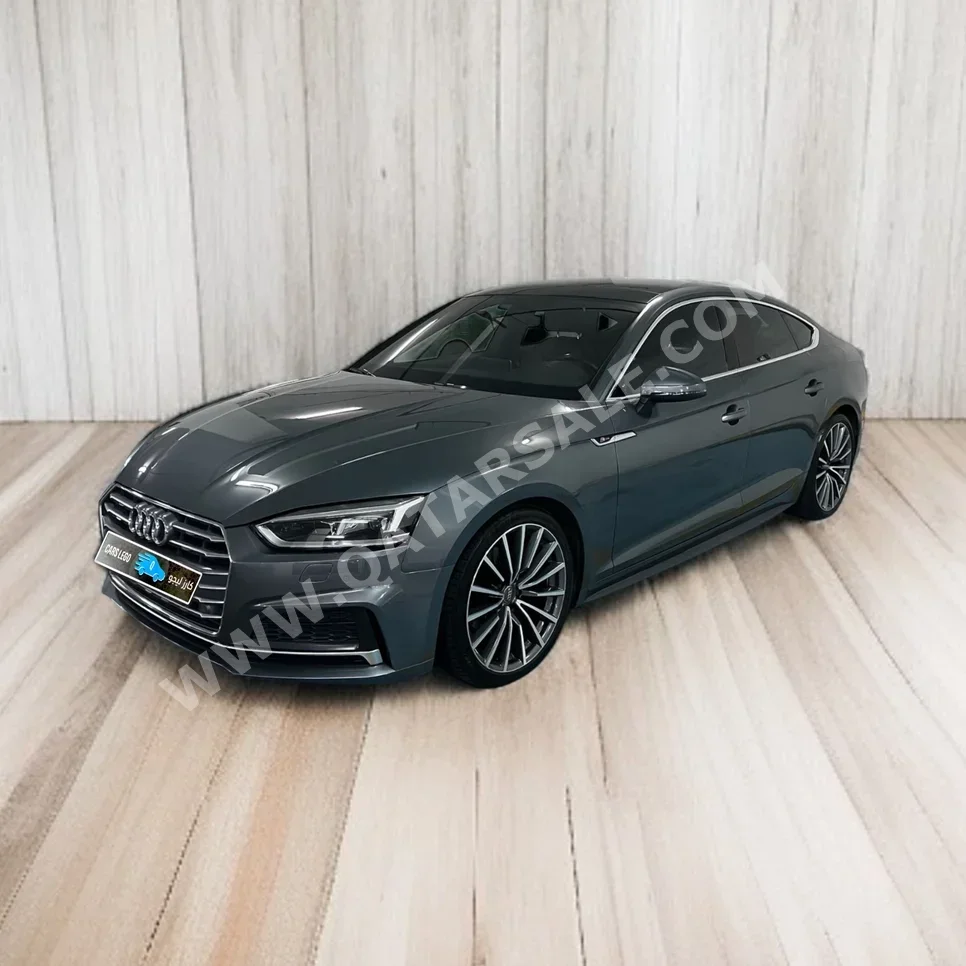 Audi  A5  2019  Automatic  53,200 Km  4 Cylinder  Rear Wheel Drive (RWD)  Sedan  Gray  With Warranty