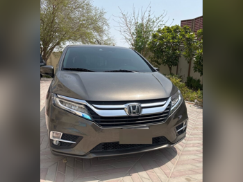 Honda  Odyssey  Touring  2019  Automatic  64,894 Km  6 Cylinder  Front Wheel Drive (FWD)  Van / Bus  Brown