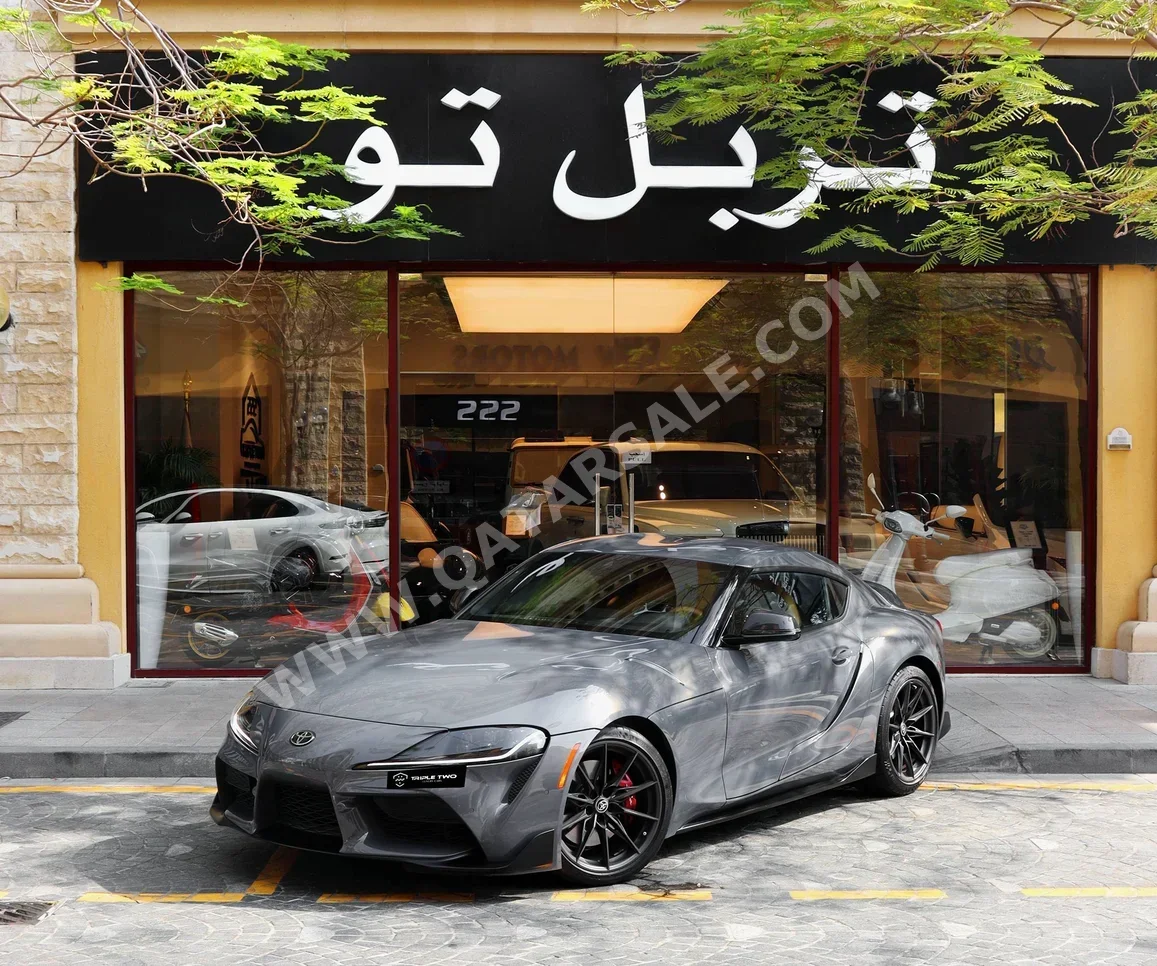 Toyota  Supra  GR  2023  Manual  5,300 Km  6 Cylinder  Rear Wheel Drive (RWD)  Coupe / Sport  Gray
