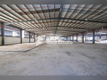 مخازن و مستودعات - الريان  - المنطقة الصناعية  -المساحة: 4400 متر مربع