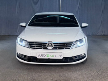 Volkswagen  Passat  CC  2014  Automatic  75,000 Km  4 Cylinder  Front Wheel Drive (FWD)  Sedan  White
