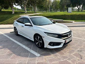 Honda  Civic  RS  2016  Automatic  148,000 Km  4 Cylinder  Front Wheel Drive (FWD)  Sedan  White