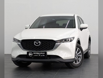 Mazda  CX  5  2023  Automatic  24,400 Km  4 Cylinder  All Wheel Drive (AWD)  SUV  White  With Warranty