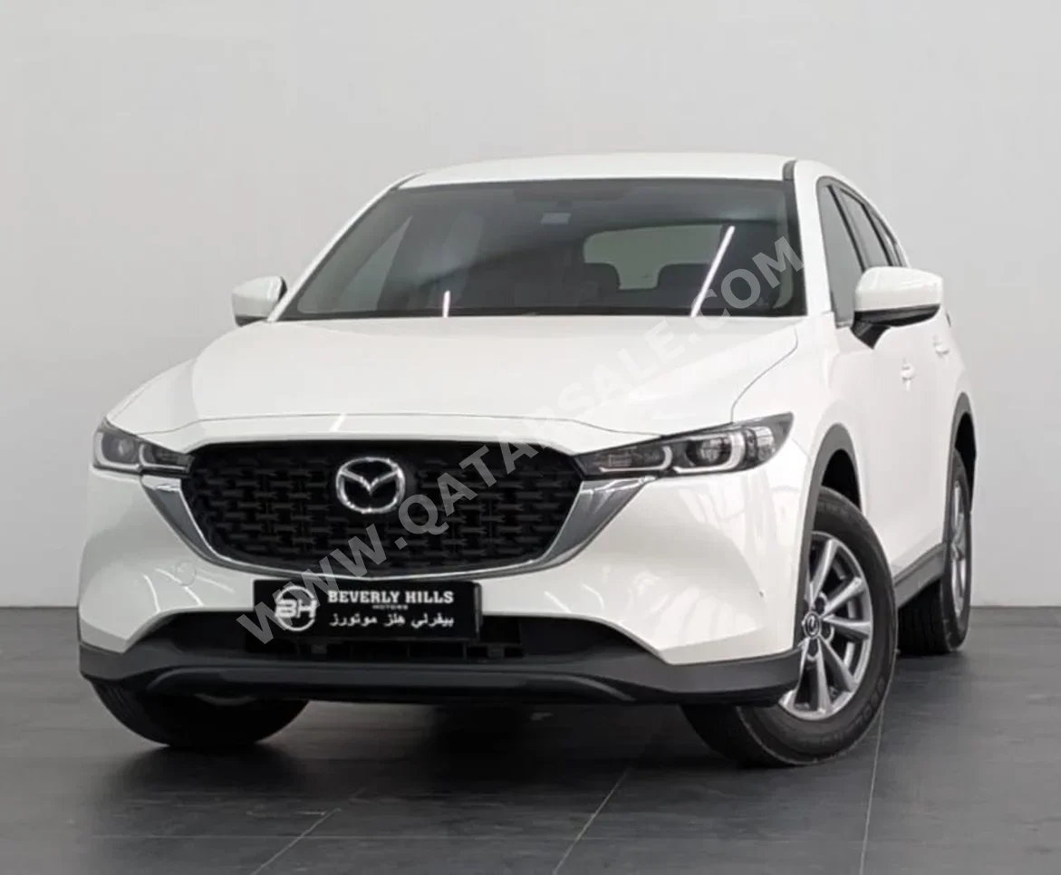 Mazda  CX  5  2023  Automatic  24,400 Km  4 Cylinder  All Wheel Drive (AWD)  SUV  White  With Warranty