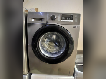 غسالة ملابس & الكل في واحد سامسونج \  غسالة تحميل أمامي  اللون الرمادي  متصلة بالواي-فاي