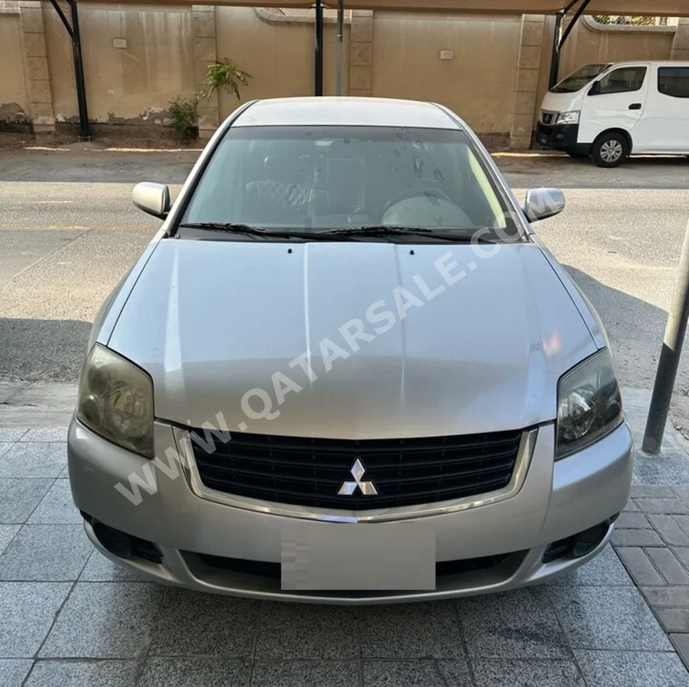 ميتسوبيشي  غالانت  2009  اوتوماتيك  350,000 كم  4 سلندر  سحب امامي  سيدان  فضي