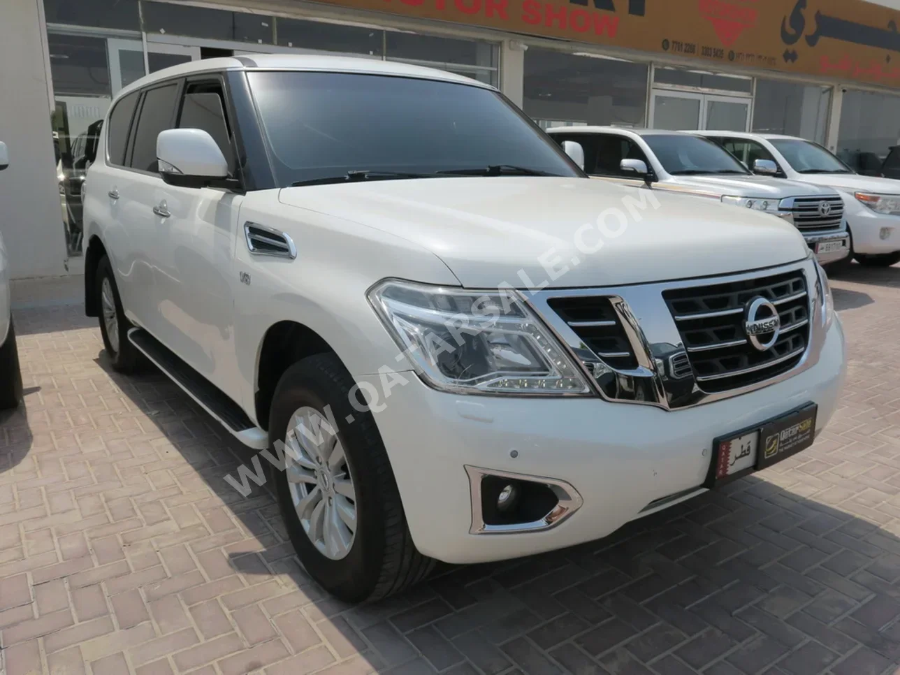 Nissan  Patrol  SE  2014  Automatic  271,000 Km  8 Cylinder  Four Wheel Drive (4WD)  SUV  White