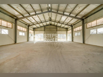 مخازن و مستودعات - الريان  - المنطقة الصناعية  -المساحة: 2000 متر مربع