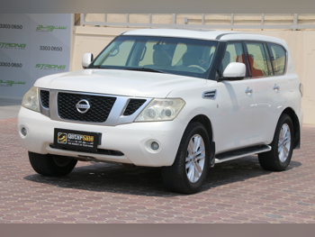 نيسان  باترول  ال اي  2013  اوتوماتيك  193,000 كم  8 سلندر  دفع رباعي  اس يو في  أبيض