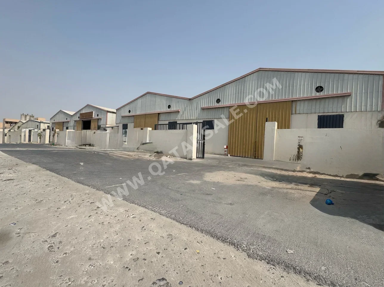 مخازن و مستودعات - الريان  - المنطقة الصناعية  -المساحة: 1000 متر مربع