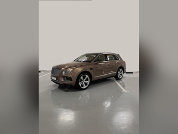 Bentley  Bentayga  Mulliner  2019  Automatic  9,000 Km  12 Cylinder  All Wheel Drive (AWD)  SUV  Gold