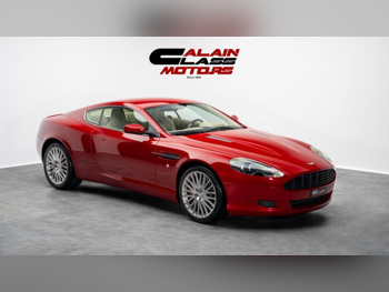 أستون مارتن  دي بي  9  2009  اوتوماتيك  185 كم  12 سلندر  دفع خلفي  كوبيه \ سبورت  أحمر