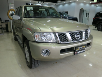 Nissan  Patrol  Safari  2023  Automatic  13,000 Km  6 Cylinder  Four Wheel Drive (4WD)  SUV  Gold  With Warranty