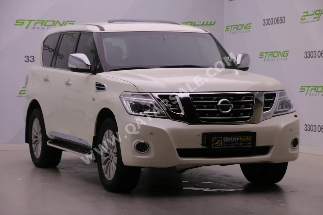Nissan  Patrol  Titanium  2017  Automatic  296,000 Km  6 Cylinder  Four Wheel Drive (4WD)  SUV  White