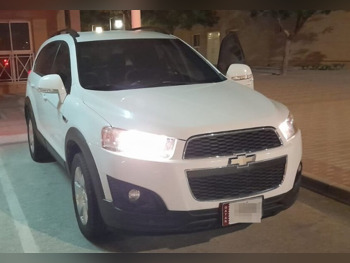 Chevrolet  Captiva  LT  2015  Automatic  138,755 Km  4 Cylinder  Front Wheel Drive (FWD)  SUV  White  With Warranty