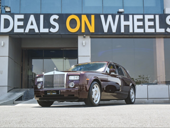 رولز - رويس  فانتوم  2004  اوتوماتيك  40,000 كم  12 سلندر  دفع خلفي  سيدان  عنابي