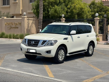 Nissan  Patrol  SE  2015  Automatic  240,000 Km  8 Cylinder  Four Wheel Drive (4WD)  SUV  White