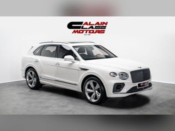 بنتلي  بينتايجا  2021  اوتوماتيك  12,358 كم  8 سلندر  دفع كلي مستمر  اس يو في  أبيض