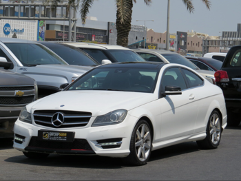 Mercedes-Benz  C-Class  250  2014  Automatic  236,000 Km  4 Cylinder  Rear Wheel Drive (RWD)  Coupe / Sport  White