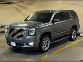 GMC  Yukon  SLT  2019  Automatic  124,000 Km  8 Cylinder  Four Wheel Drive (4WD)  SUV  Gray