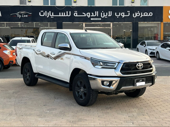 تويوتا  هاي لوكس  2024  اوتوماتيك  3,000 كم  4 سلندر  دفع رباعي  بيكب  أبيض  تحت الضمان