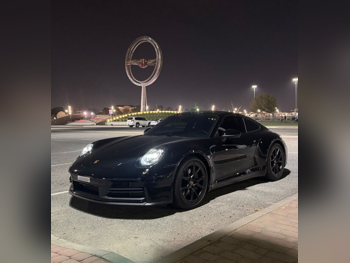 Porsche  911  Carrera  2025  Automatic  6,000 Km  6 Cylinder  Rear Wheel Drive (RWD)  Coupe / Sport  Black  With Warranty