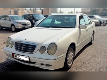 Mercedes-Benz  E-Class  240  2001  Automatic  197,000 Km  6 Cylinder  Rear Wheel Drive (RWD)  Sedan  White