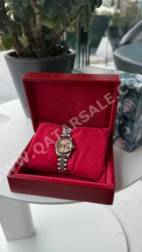 ساعات - رولكس  - ساعات ميكانيكية  - زهري  - ساعات نسائي