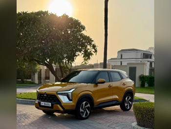 Mitsubishi  XForce  2025  Automatic  10,000 Km  4 Cylinder  Four Wheel Drive (4WD)  SUV  Gold  With Warranty