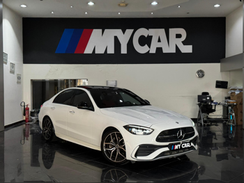 مرسيدس - بنز  سي - كلاس  300 AMG  2023  اوتوماتيك  80,000 كم  4 سلندر  دفع خلفي  سيدان  أبيض  تحت الضمان