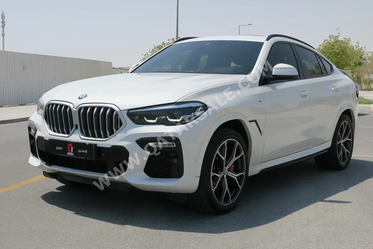 BMW  X-Series  X6  2021  Automatic  80,000 Km  6 Cylinder  Four Wheel Drive (4WD)  SUV  White  With Warranty
