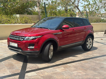 Land Rover  Evoque  2015  Automatic  100,000 Km  4 Cylinder  Four Wheel Drive (4WD)  SUV  Red