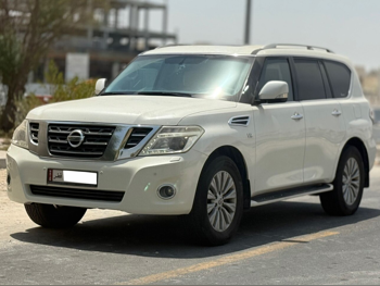 Nissan  Patrol  Titanium  2017  Automatic  156,000 Km  8 Cylinder  Four Wheel Drive (4WD)  SUV  White