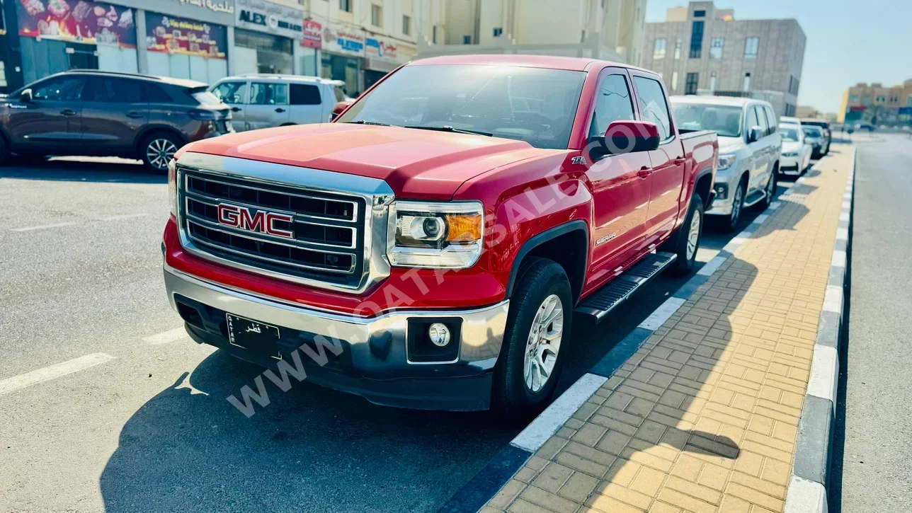 جي ام سي  سييرا  اس ال اي  2015  اوتوماتيك  118,000 كم  8 سلندر  دفع رباعي  بيكب  أحمر