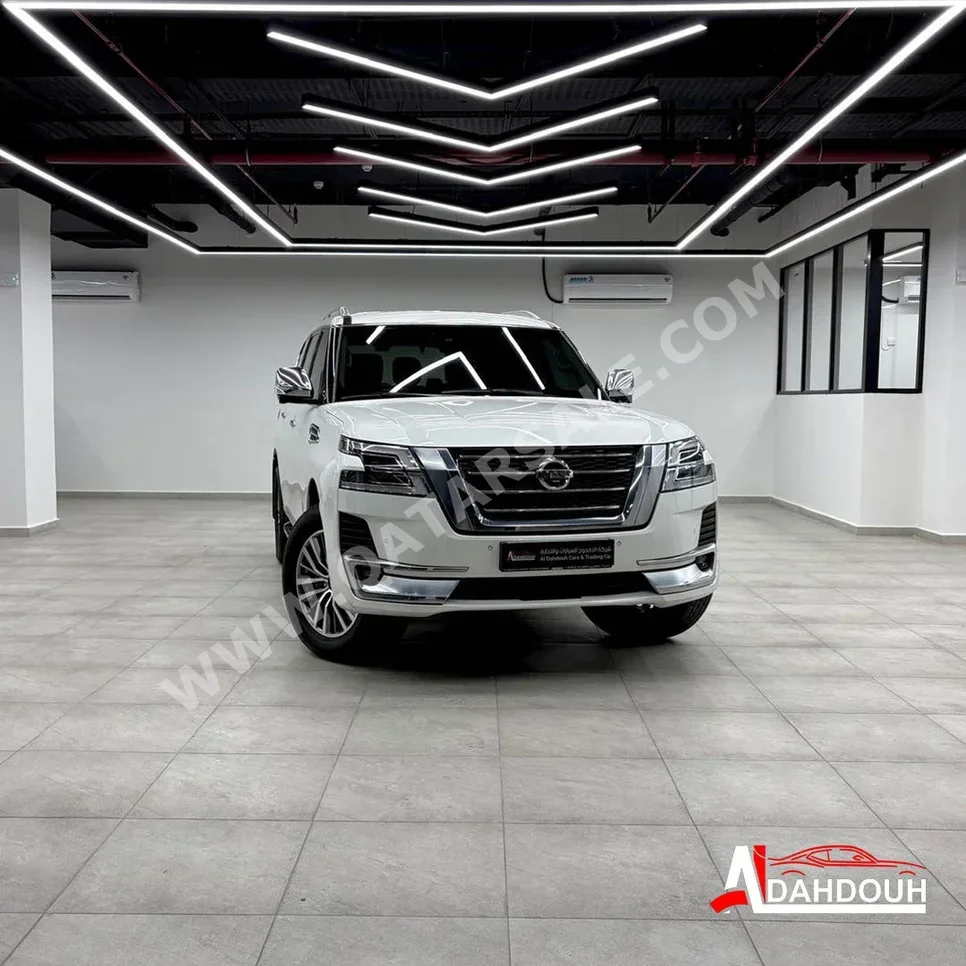 نيسان  باترول  بلاتنيوم  2021  اوتوماتيك  154,000 كم  6 سلندر  دفع رباعي  اس يو في  أبيض