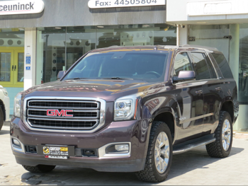 GMC  Yukon  SLT  2017  Automatic  70,000 Km  8 Cylinder  Four Wheel Drive (4WD)  SUV  Purple
