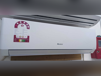مكيفات الهواء جريي  يشمل التحكم عن بعد  ضمان  مع التسليم  مع التركيب