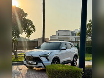 Mitsubishi  XForce  2025  Automatic  11,000 Km  4 Cylinder  Front Wheel Drive (FWD)  SUV  White  With Warranty