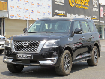 Nissan  Patrol  Titanium  2023  Automatic  0 Km  8 Cylinder  Four Wheel Drive (4WD)  SUV  Black  With Warranty