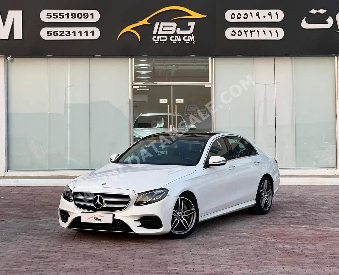 Mercedes-Benz  E-Class  350 AMG  2019  Automatic  167,000 Km  4 Cylinder  Rear Wheel Drive (RWD)  Sedan  White