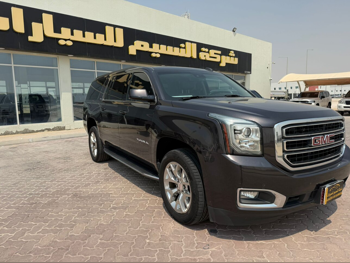 GMC  Yukon  SLT  2018  Automatic  115,000 Km  8 Cylinder  Four Wheel Drive (4WD)  SUV  Brown