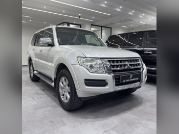 ميتسوبيشي  باجيرو  2019  اوتوماتيك  192,000 كم  6 سلندر  دفع رباعي  اس يو في  أبيض لؤلؤي