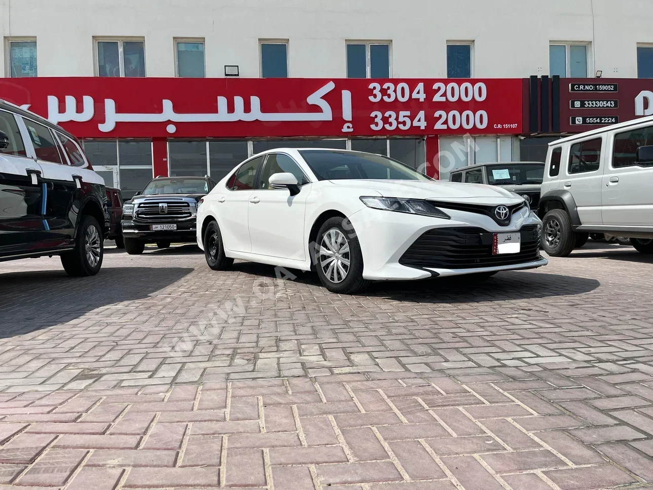 Toyota  Camry  LE  2019  Automatic  85,000 Km  4 Cylinder  Front Wheel Drive (FWD)  Sedan  White